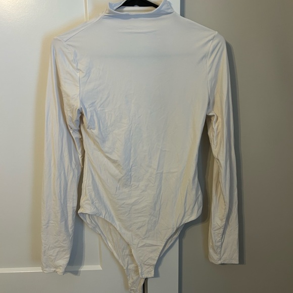 Chic White Long Sleeve Turtleneck Bodysuit - Picture 2 of 4